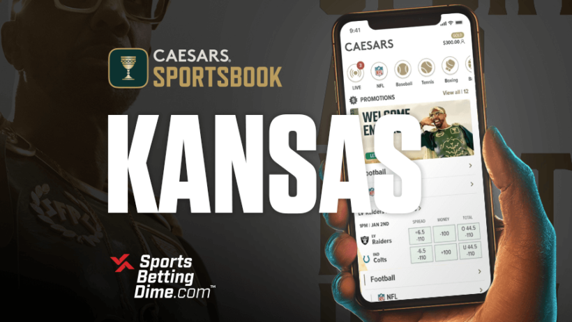 Caesars Sportsbook Kansas sports betting hand holding mobile phone with app