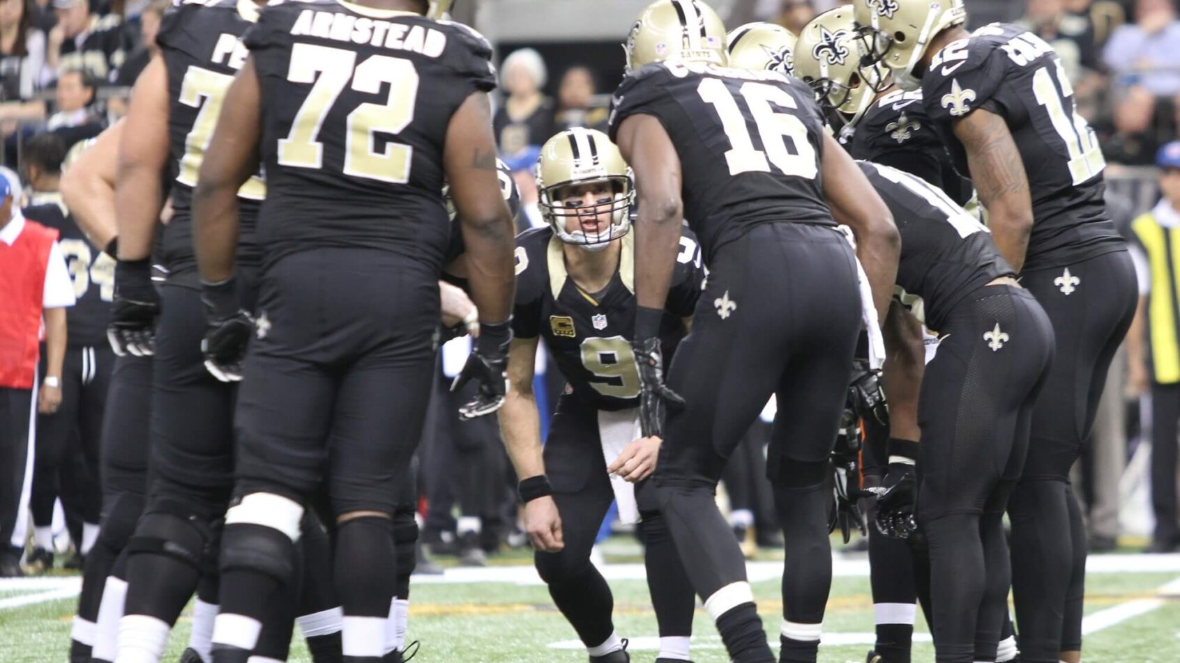 Drew Brees in the huddle in 2015