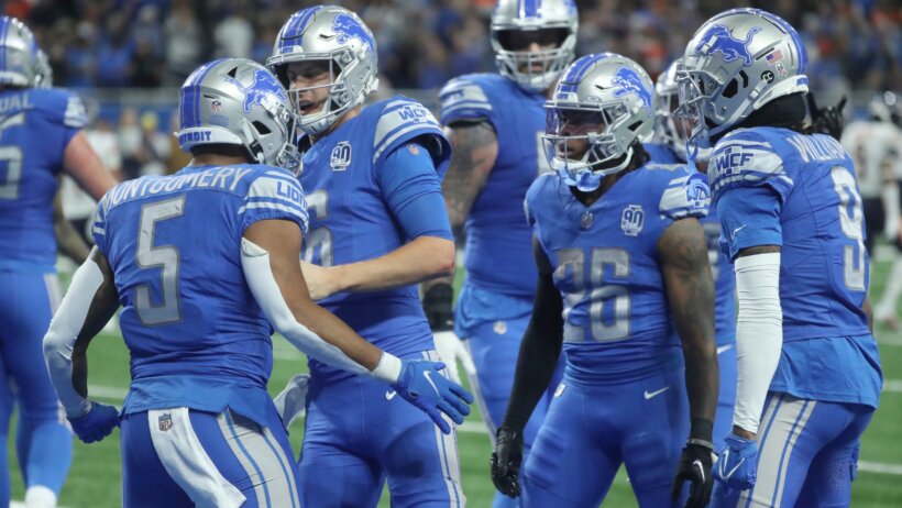 Detroit Lions players celebrate after scoring a touchdown