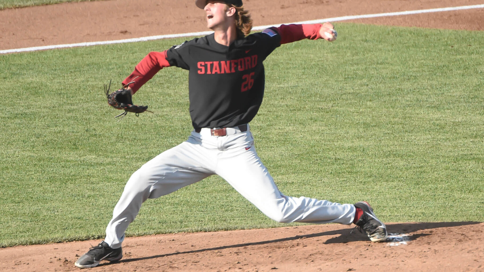 Quinn Mathews throws pitch
