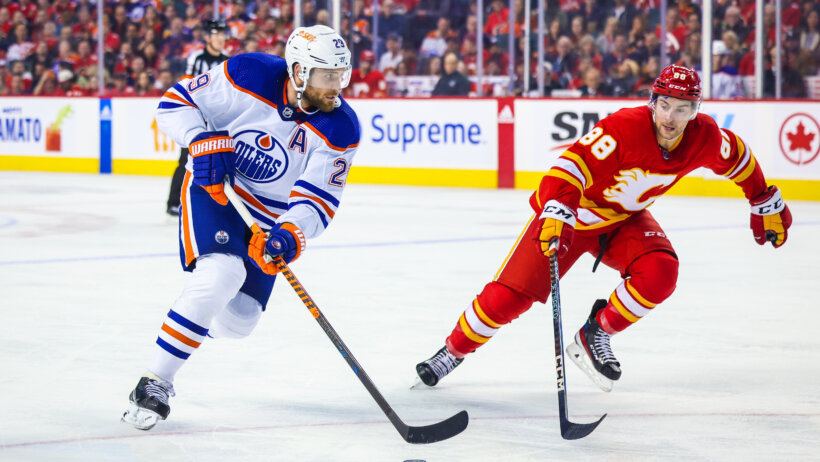 Edmonton Oilers center Leon Draisaitl and Calgary Flames left wing Andrew Mangiapane