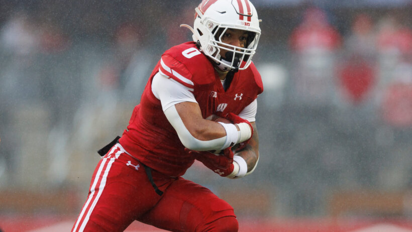 Wisconsin Badgers running back Braelon Allen rushes with the footbal