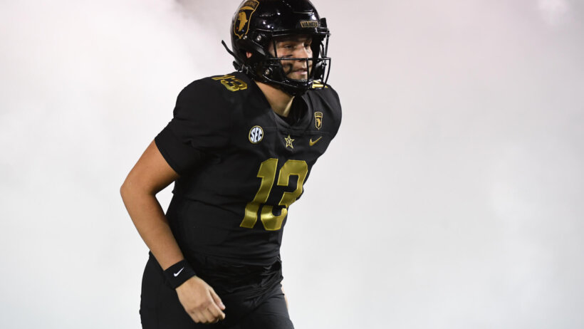 Vanderbilt Commodores quarterback AJ Swann runs onto the field