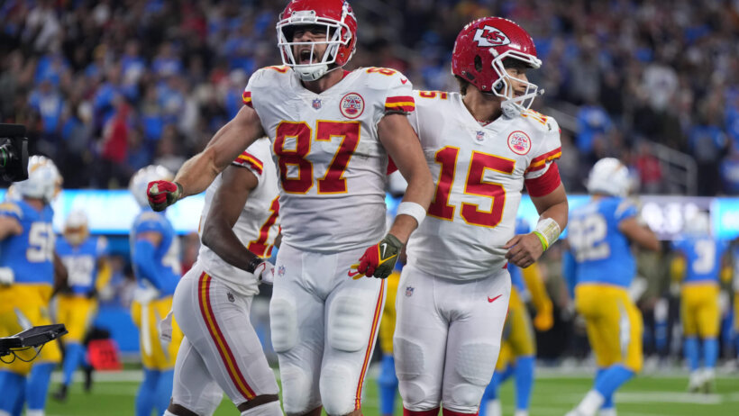 Kansas City Chiefs tight end Travis Kelce celebrates with quarterback Patrick Mahomes