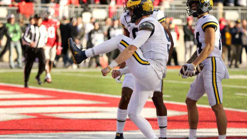 J.J. McCarthy celebrates TD vs Ohio State.