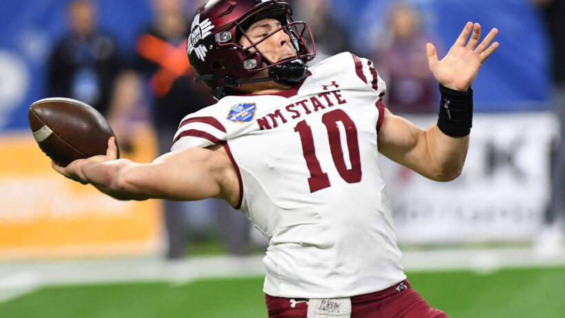 Mexico State quarterback Diego Pavia throws a pass