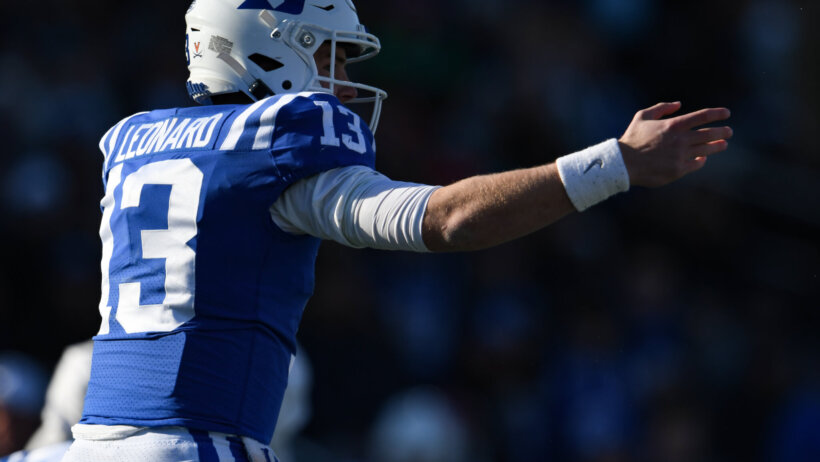 Riley Leonard pointing at line of scrimmage