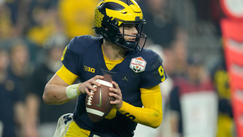 Michigan Wolverines quarterback J.J. McCarthy looks to throw