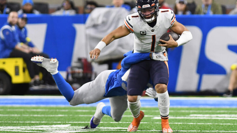 Justin Fields sacked by the Lions.