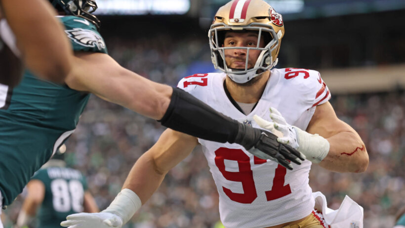 San Francisco 49ers defensive end Nick Bosa (97) battles with Philadelphia Eagles offensive tackle Lane Johnson (65)