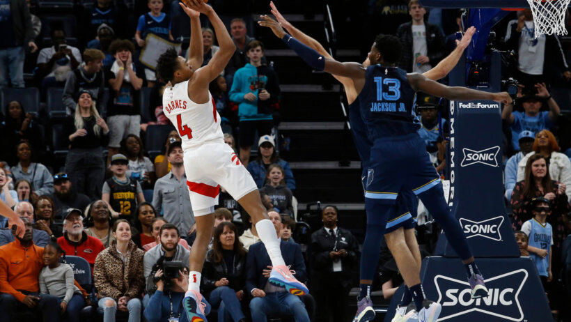 Toronto Raptors forward Scottie Barnes shoots over Memphis Grizzlies forward Jaren Jackson Jr