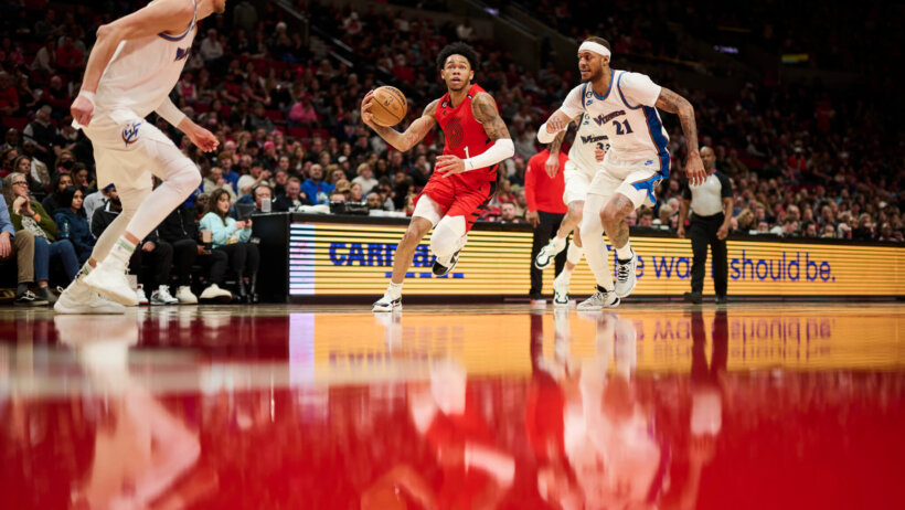 Portland Trail Blazers guard Anfernee Simons drives past Washington Wizards center Daniel Gafford