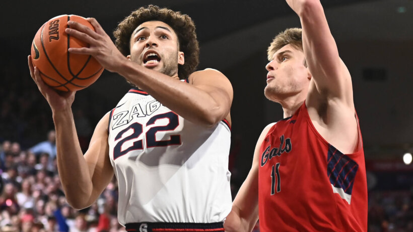 Gonzaga Bulldogs forward Anton Watson goes for a layup against Saint Mary's Gaels center Mitchell Saxen