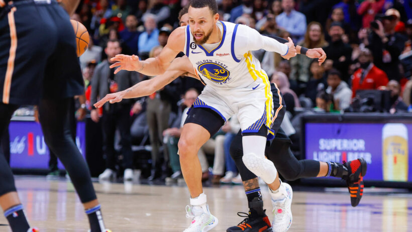 Golden State Warriors guard Stephen Curry guarding an Atlanta Hawks player