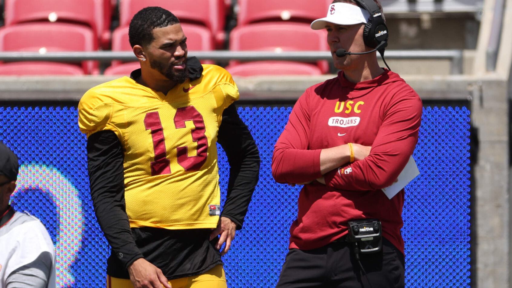 USC Trojans QB Caleb Williams talking with head coach Lincoln Riley