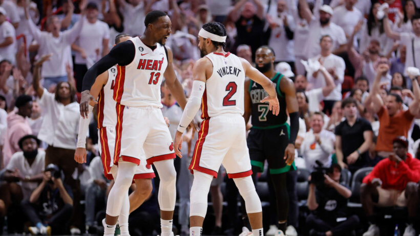 Bam Adebayo and Gabe Vincent celebrate on court