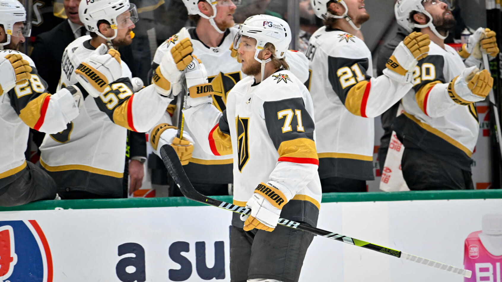 The Vegas Golden Knights team bench celebrates a goal scored by center William Karlsson