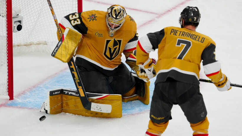 Vegas Golden Knights goaltender Adin Hill makes a save on a Dallas Stars shot