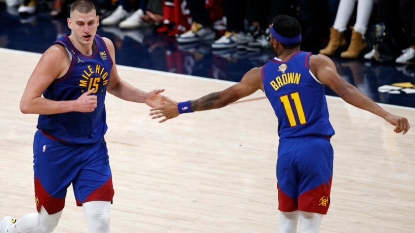 Nikola Jokic and Bruce Brown high-five