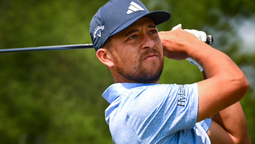 Xander Schauffele watches a tee shot