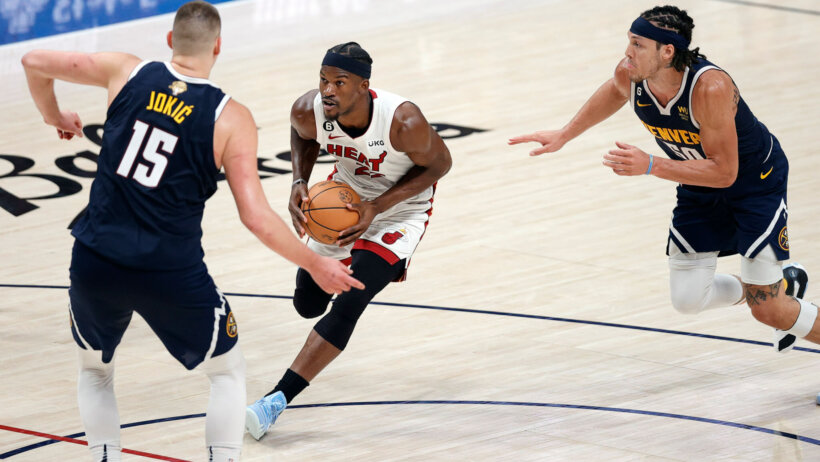 Miami Heat forward Jimmy Butler drives to the basket