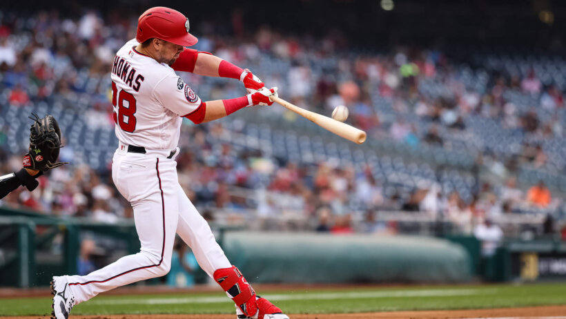 Lane Thomas smacks a hit versus the Diamondbacks.