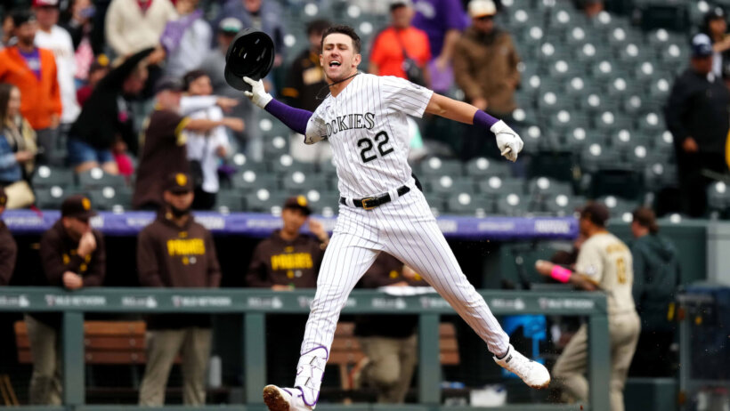 Colorado Rockies left fielder Nolan Jones celebrates a walk-off homer