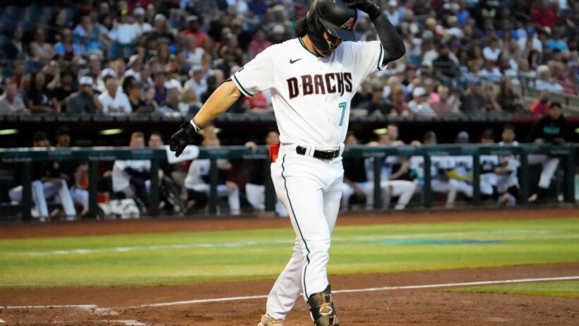 Arizona Diamondbacks Corbin Carroll walking to first base