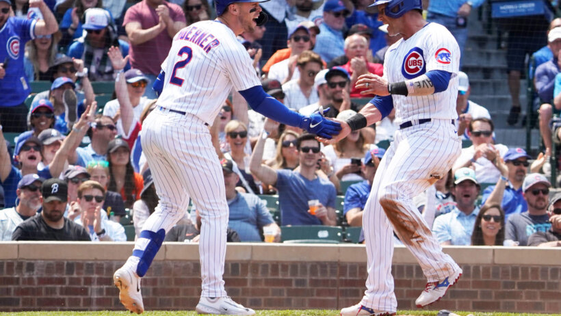 Chicago Cubs celebrate a run versus the Baltimore Orioles.