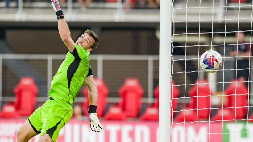 D.C. United goalkeeper Tyler Miller (1) looks at Real Salt Lake midfielder Pablo Ruiz (7) shoot in the goal