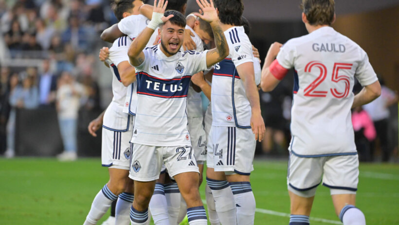 Vancouver Whitecaps midfielder Ryan Raposo (27) celebrates a goal with Vancouver Whitecaps midfielder Ryan Gauld