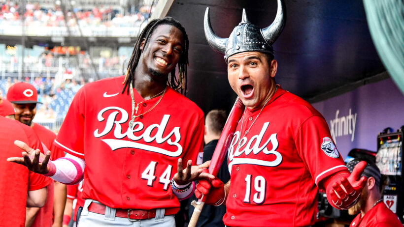 Elly De La Cruz and Joey Votto dugout celebration.