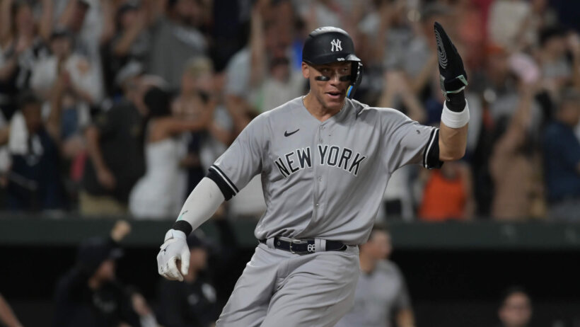 Aaron Judge waving at teammates