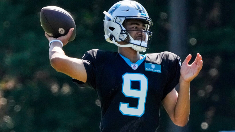 Bryce Young fires a pass during training camp.