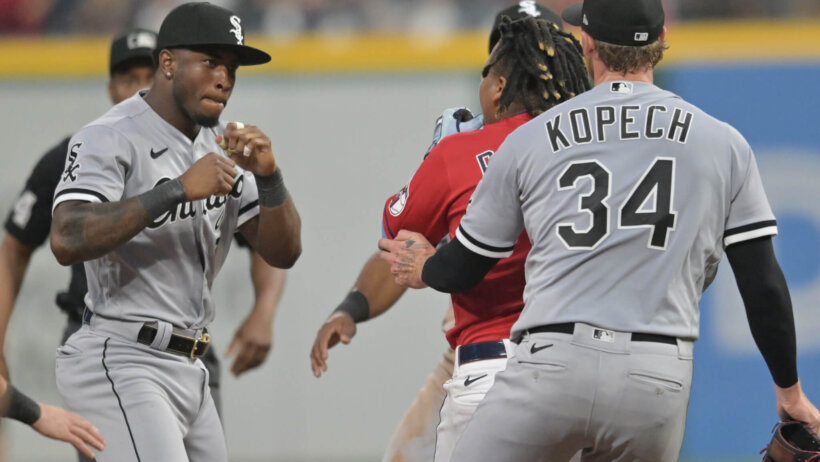 Tim Anderson raises his fists to fight Jose Ramirez