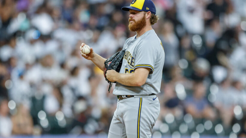 Milwaukee Brewers starting pitcher Brandon Woodruff holds the ball