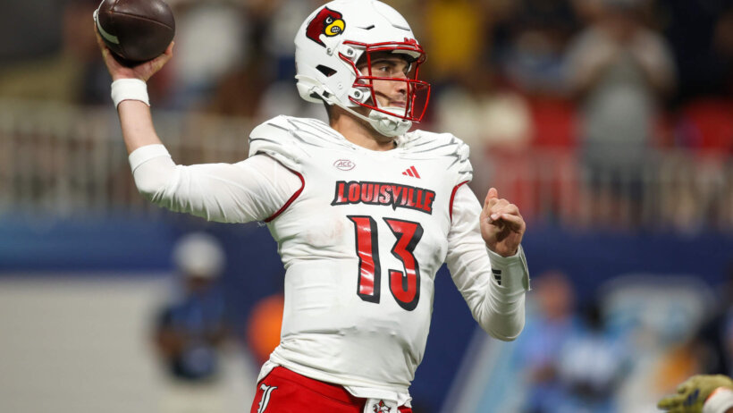 Louisville Cardinals quarterback Jack Plummer throws a pass