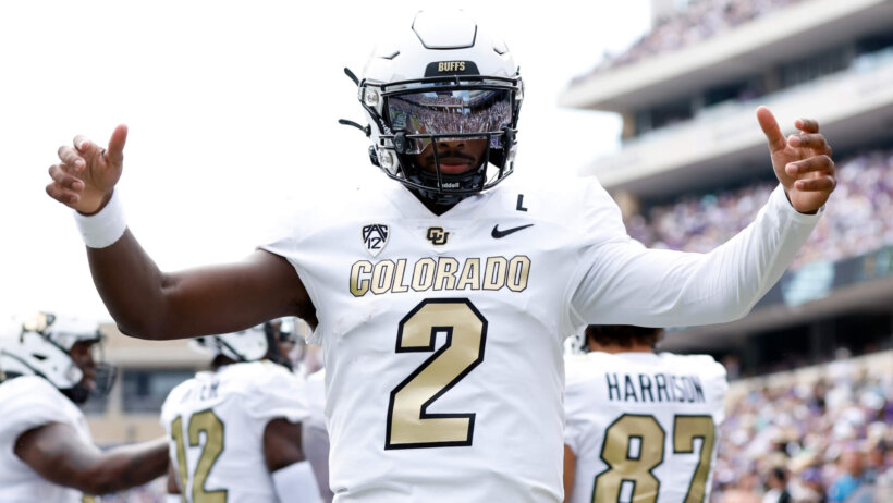 Colorado Buffaloes quarterback Shedeur Sanders celebrates a touchdown vs TCU
