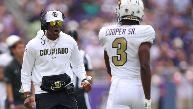Colorado Buffaloes head coach Deion Sanders reacts