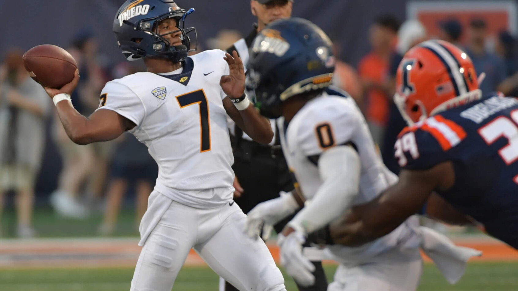 Toledo Rockets quarterback Dequan Finn (7) passes
