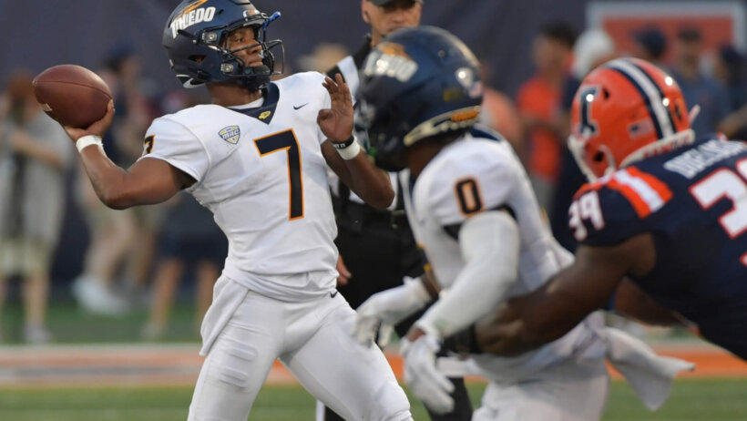 Toledo Rockets quarterback Dequan Finn (7) passes