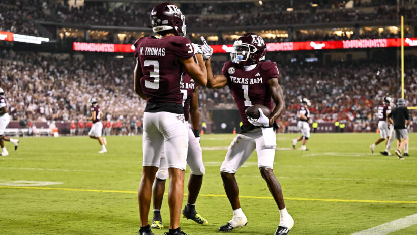 Noah Thomas and Evan Stewart celebrate in end zone