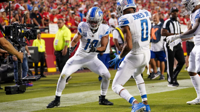Amon-Ra St. Brown celebrates a touchdown