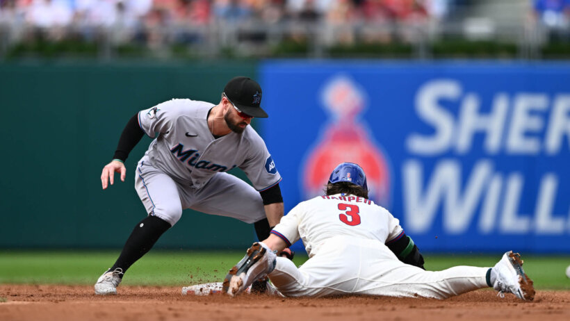 Phillies Bryce Harper sliding into second base against the Marlins