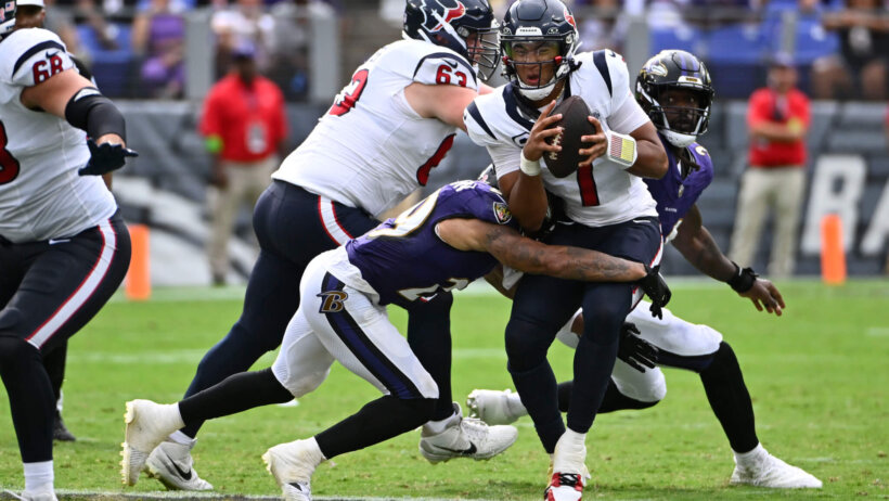 Houston Texans quarterback C.J. Stroud getting sacked by the Baltimore Ravens