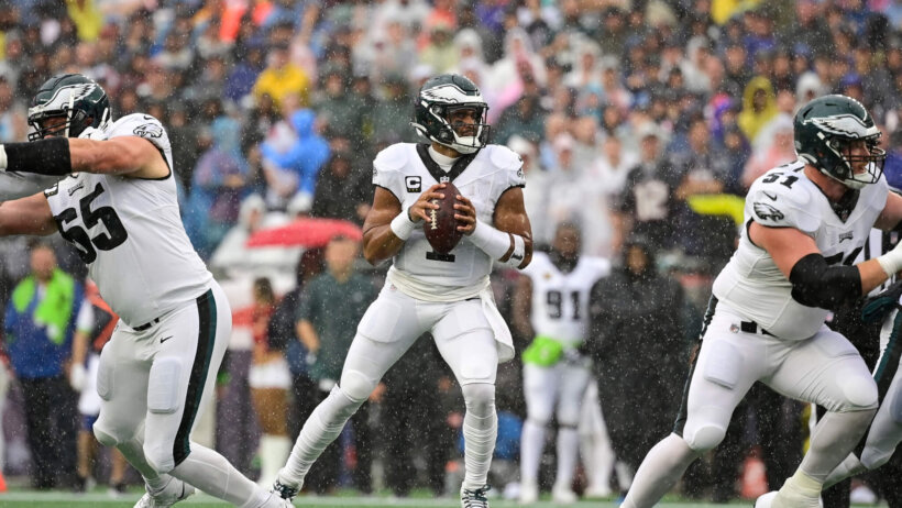 Philadelphia Eagles quarterback Jalen Hurts (1) drops back to pass against the New England Patriots i