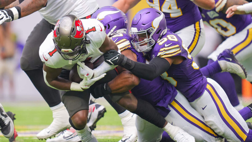 Rachaad White tackled by the Vikings in Week 1