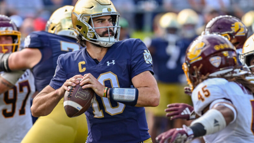 Notre Dame Fighting Irish quarterback Sam Hartman throws