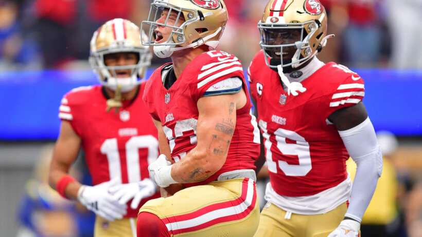 San Francisco 49ers running back Christian McCaffrey (23) celebrates his touchdown