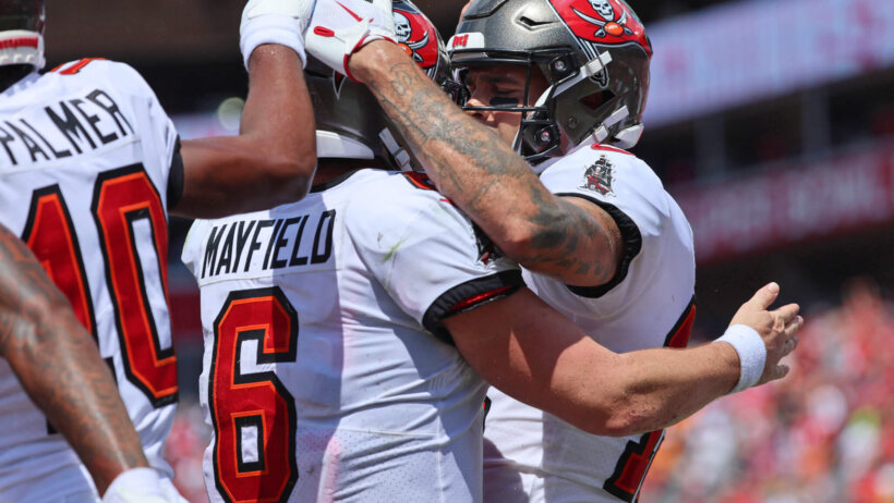 Tampa Bay Buccaneers Baker Mayfield and Mike Evans celebrate together.